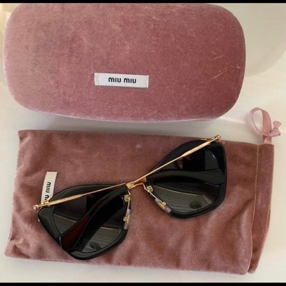 Miu Miu Black sunglasses w Gold frame